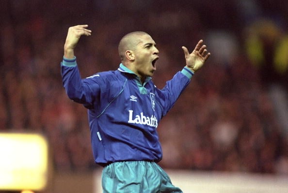 17 Dec 1994:  Stan Collymore of Nottingham Forest celebrates during an FA Carling Premiership match against Manchester United at Old Trafford in Ma...