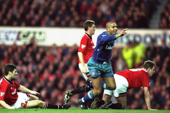 17 Dec 1994:  Dennis Irwin, Gary Pallister of Manchester United and Stan Collymore of Nottingham Forest in action during an FA Carling Premiership ...