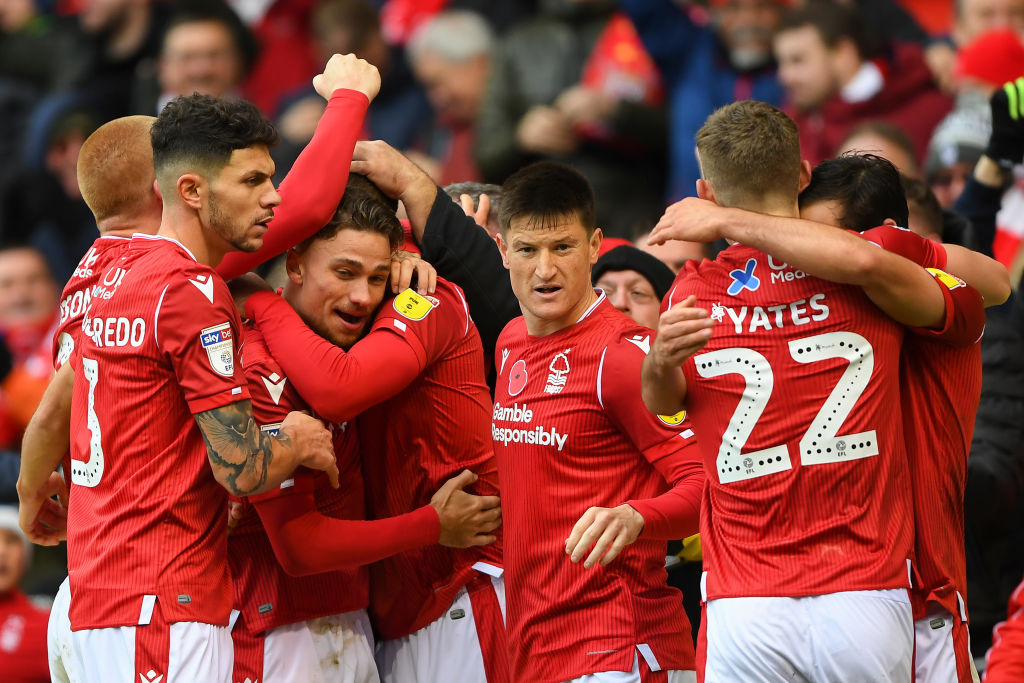 The Reds celebrate after Lewis Grabban (7) of Nottingham Forest scores a goal to make it 1-0 during the Sky Bet Championship match between Nottingh...