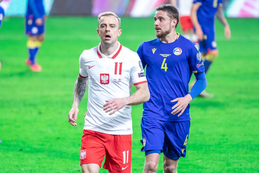 Kamil Grosicki of Poland and Marc Rebes of Andorra in action