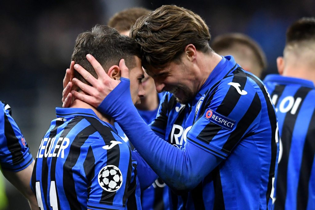 Remo Freuler of Atalanta BC (L) celebrates with Hans