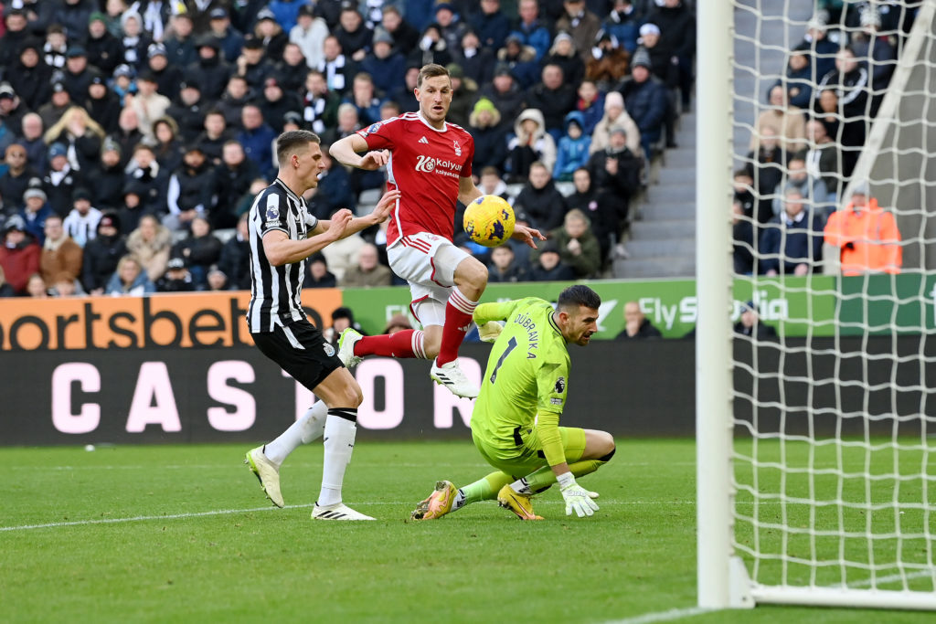 Chris Wood scores against Newcastle.