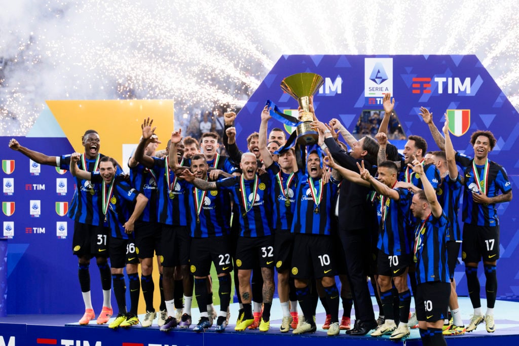 Lautaro Martinez (C) of FC Internazionale lifts the Scudetto