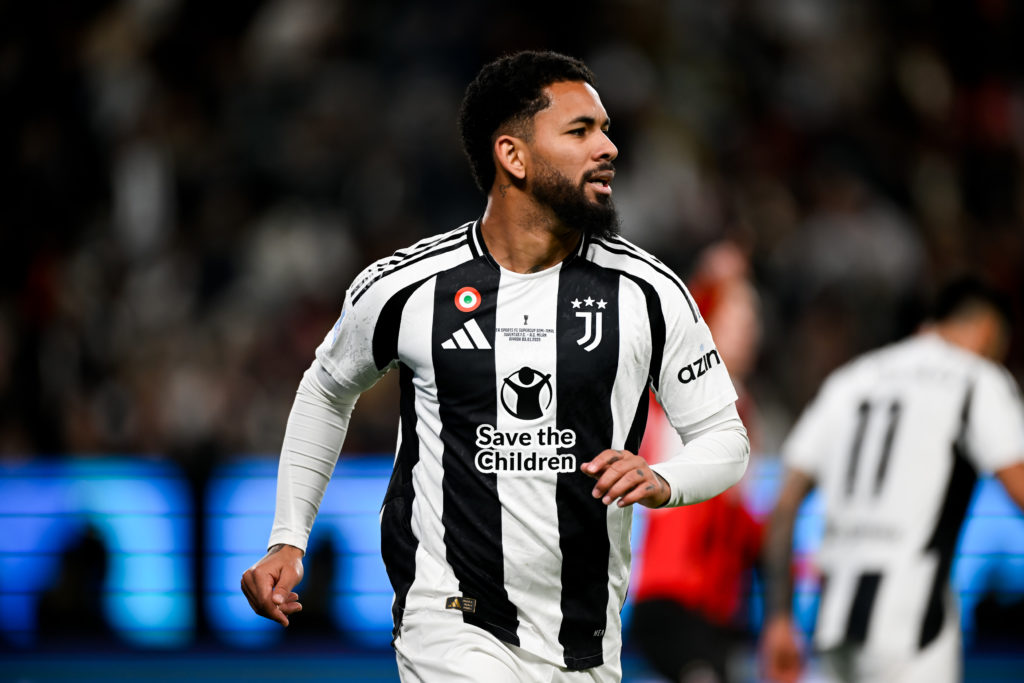 Douglas Luiz in action for Juventus against AC Milan