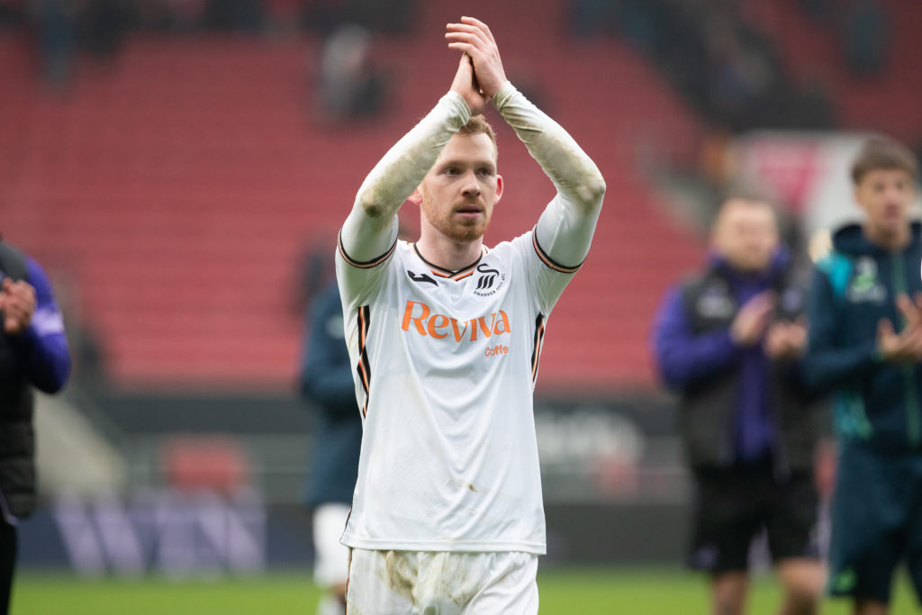 Lewis O'Brien celebrates at full time of the Sky Bet Championship match between Bristol City and Swansea City