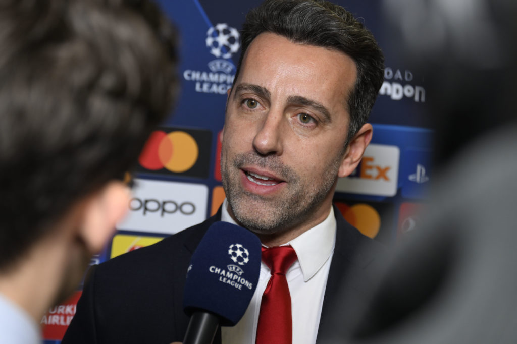 Edu speaks to the media during a