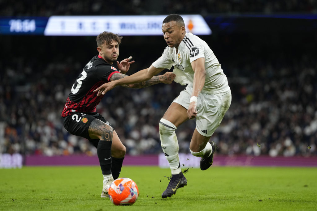 RCD Mallorca defender Pablo Maffeo in action against Kylian Mbappe.