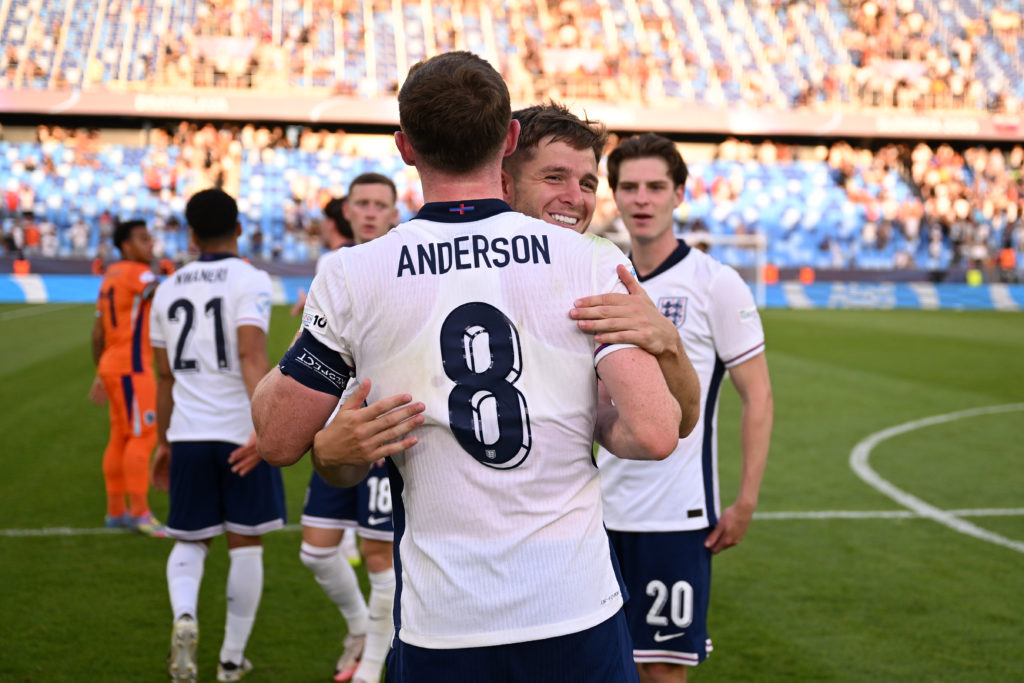 Elliot Anderson congratulates James McAtee after England under-21 win.