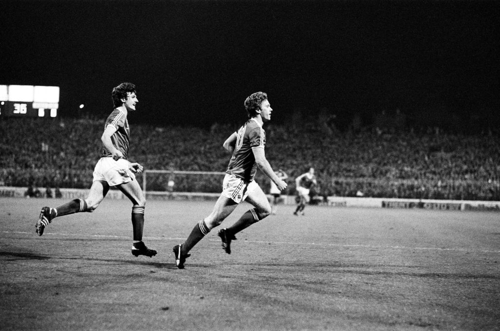 Tony Woodcock runs to celebrate after scoring for Nottingham Forest against AEK Athens in the European Cup.