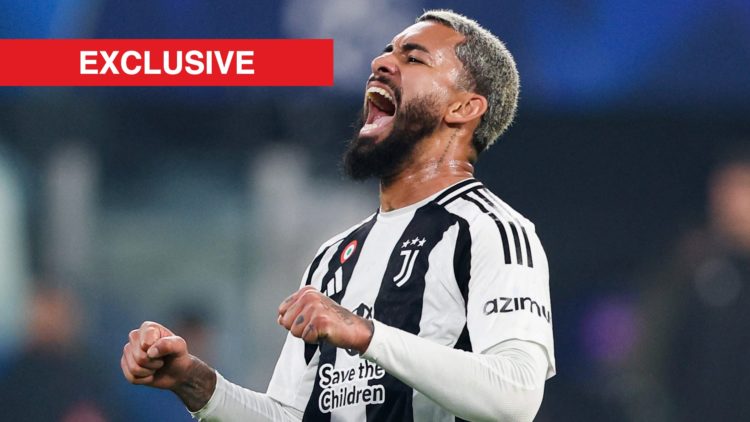 Douglas Luiz celebrates during Juventus vs PSV in the UEFA Champions League.