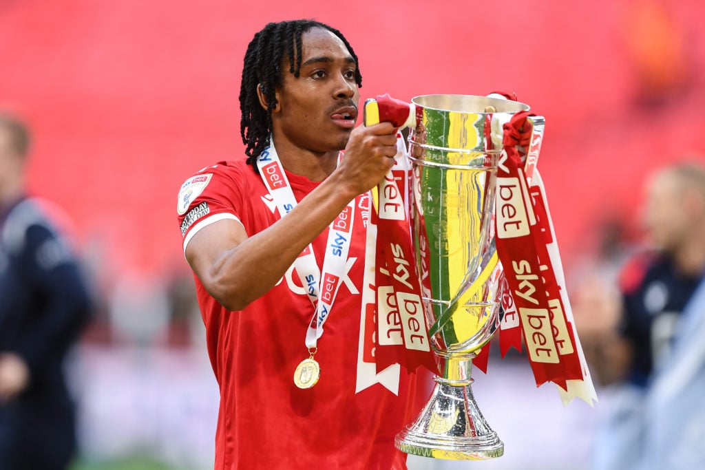 Djed Spence celebrates winning the Sky Bet Championship play-off final with Nottingham Forest