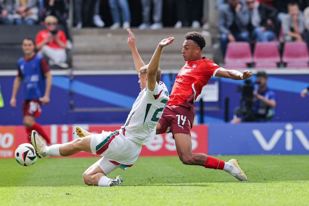 Dan Ndoye battling for the ball for Switzerland in EURO 2024 against Hungary's Adam Lang