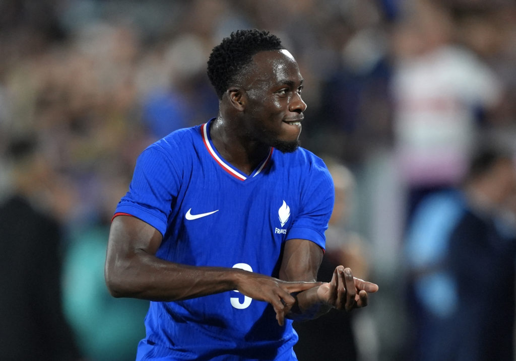 Arnaud Kalimuendo celebrates after France beat Argentina at the 2024 Olympics.