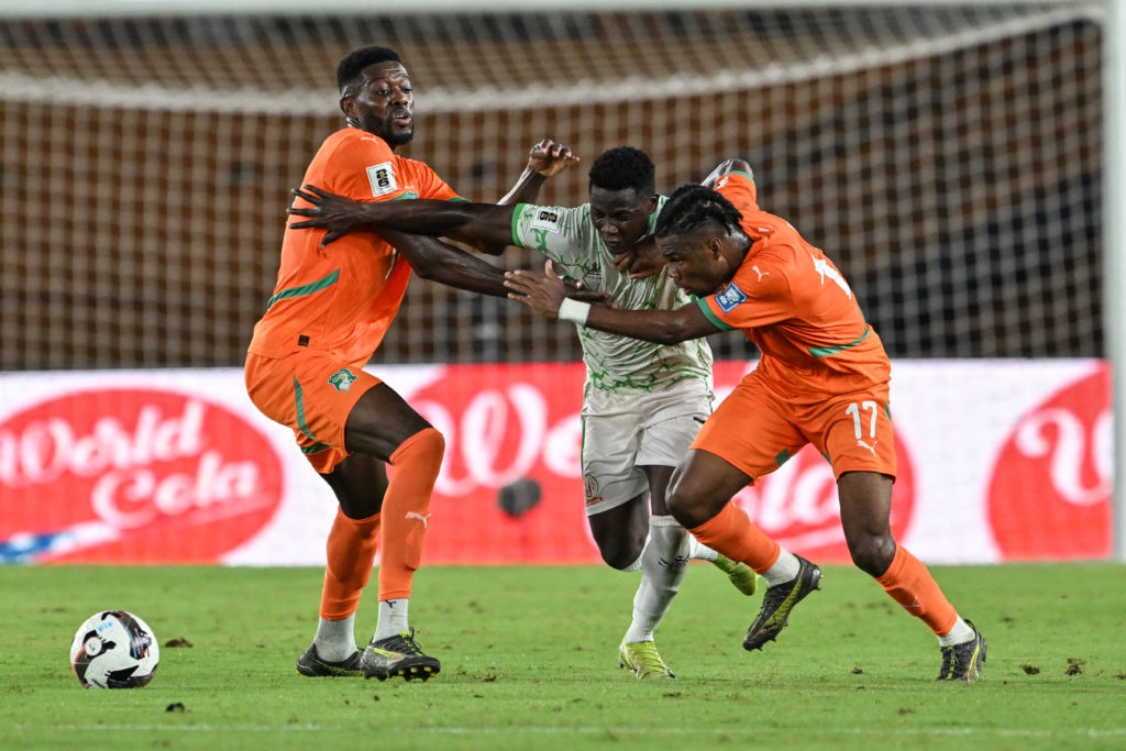 Ibrahim Sangare in action for Ivory Coast with defender Luck Zogbe battling against Burundi player Jean-Claude Girumugish
