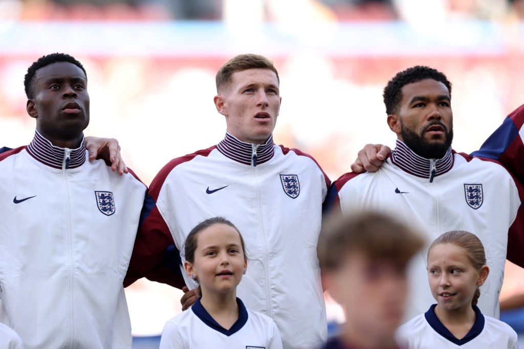 Elliot Anderson singing England national anthem alongside Marc Guehi and Reece James