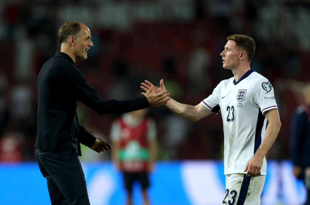 Elliot Anderson and Thomas Tuchel shake hands after England beat Serbia.
