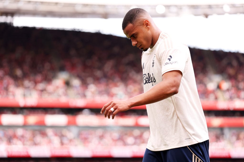 Murillo limps off injured against Arsenal.