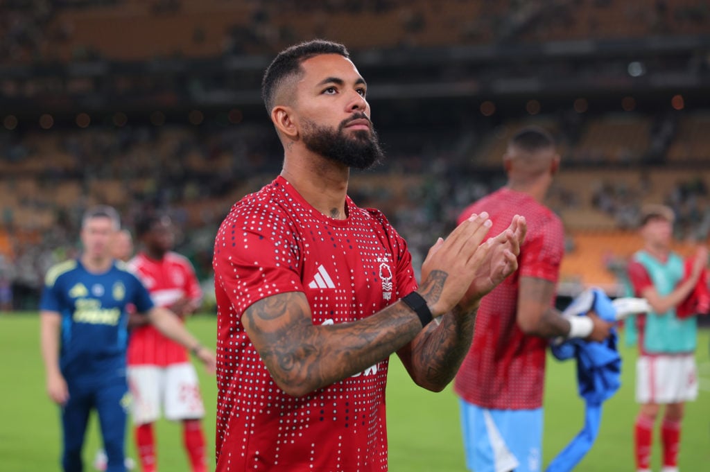 Douglas Luiz applauds the Nottingham Forest fans after Real Betis draw.