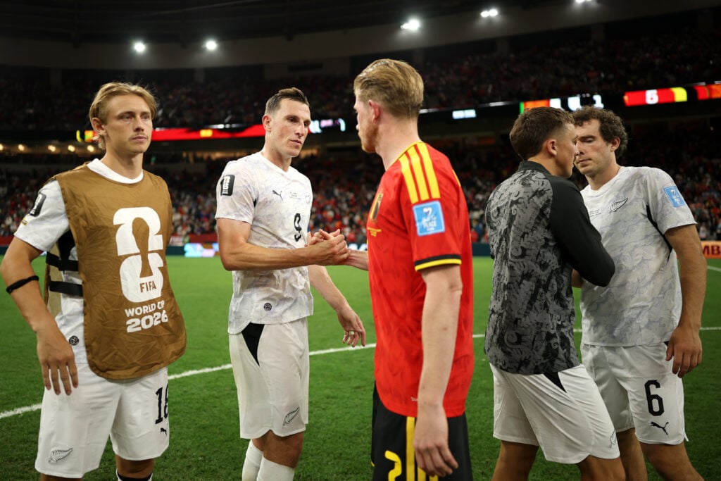 Chris Wood shakes hands with Kevin De Bruyne,